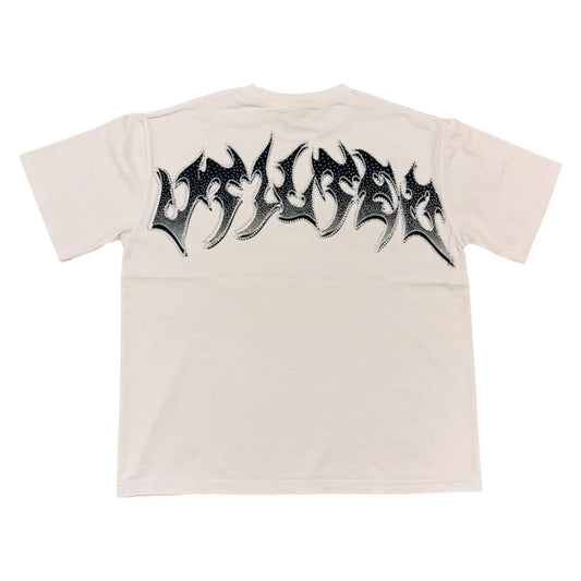 Vtilted "BLINDED" oversized graphic tee in White — a blindfolded praying child rendered in chiaroscuro oil-painting style, surrounded by storm clouds, roses, and butterflies — a meditation on
