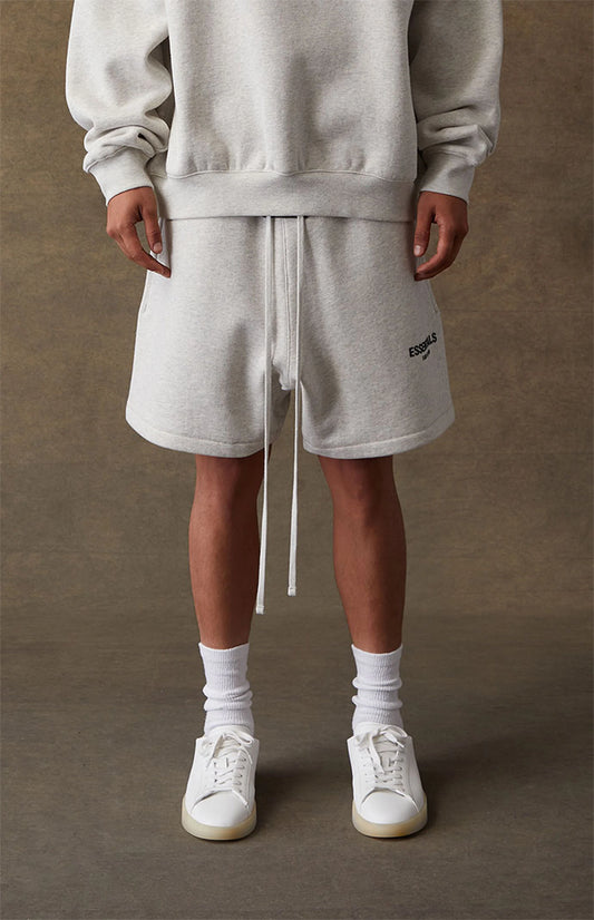 Fear of God Essentials Sweatshorts - Light Oatmeal — Jerry Lorenzo Essentials heavyweight basic, fleece sweatshort, front view