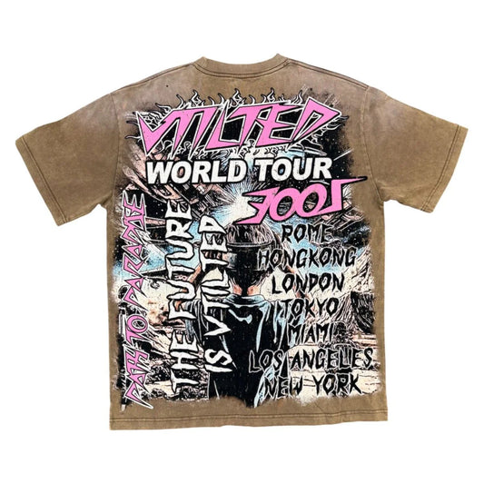 Vtilted "TOKYO" oversized graphic tee in Brown Wash — a child in a VR headset framed by a comic-book world tour (ROME · HONG KONG · LONDON · TOKYO · MIAMI · LOS ANGELES · NEW YORK) under "E