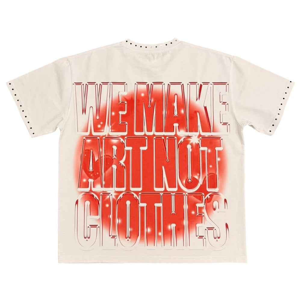 Vtilted "LOVED" oversized graphic tee in White — a winged cherub praying in front of a flaming heart, framed by gothic "Vtilted Dreams" lettering and the words "ME FOREVER&qu