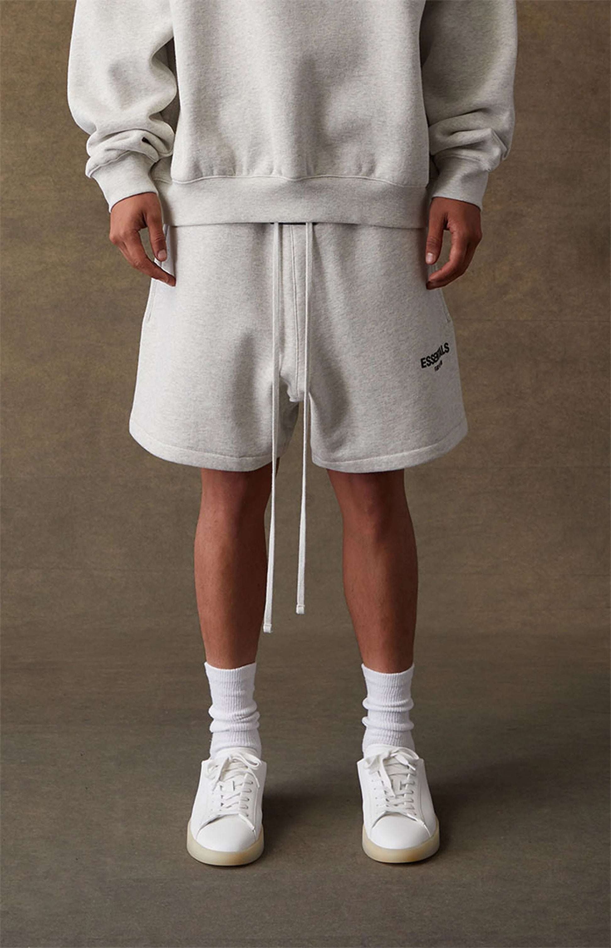 Fear of God Essentials Sweatshorts - Light Oatmeal — Jerry Lorenzo Essentials heavyweight basic, fleece sweatshort, front view