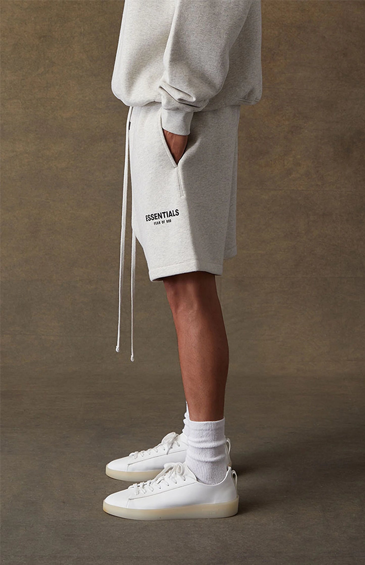 Fear of God Essentials Sweatshorts - Light Oatmeal — Jerry Lorenzo Essentials heavyweight basic, fleece sweatshort, front view
