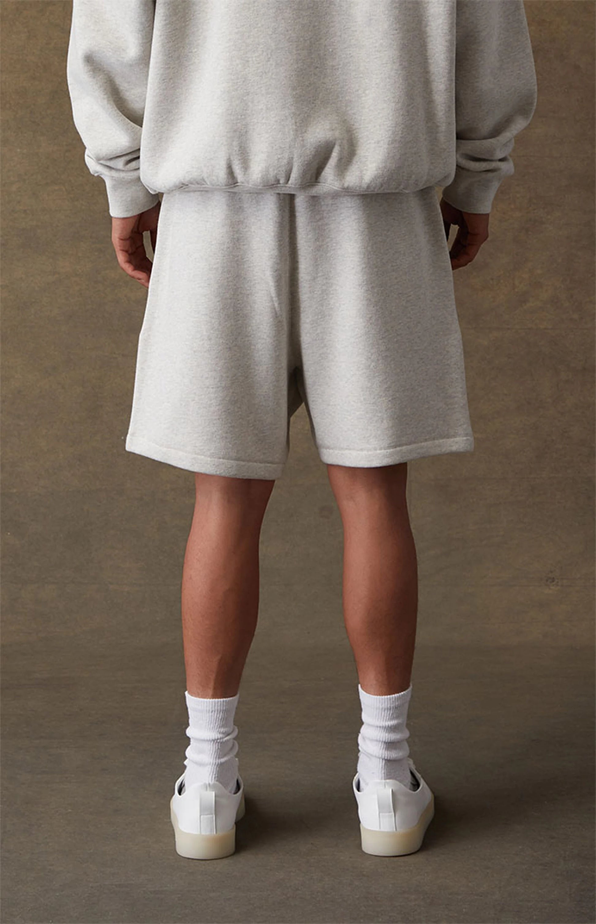Fear of God Essentials Sweatshorts - Light Oatmeal — Jerry Lorenzo Essentials heavyweight basic, fleece sweatshort, front view