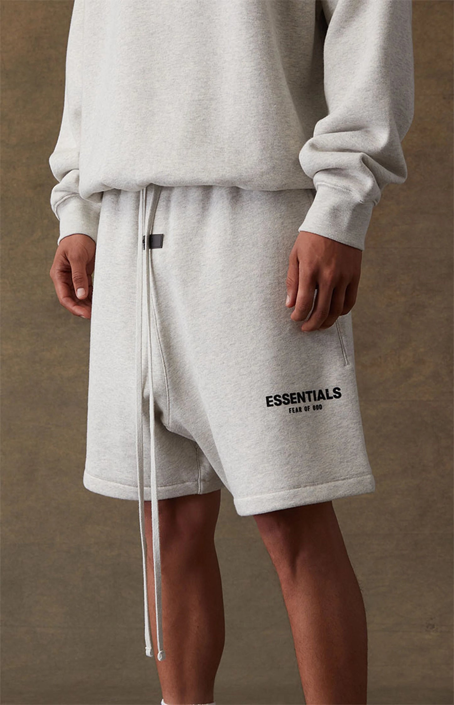 Fear of God Essentials Sweatshorts - Light Oatmeal — Jerry Lorenzo Essentials heavyweight basic, fleece sweatshort, front view