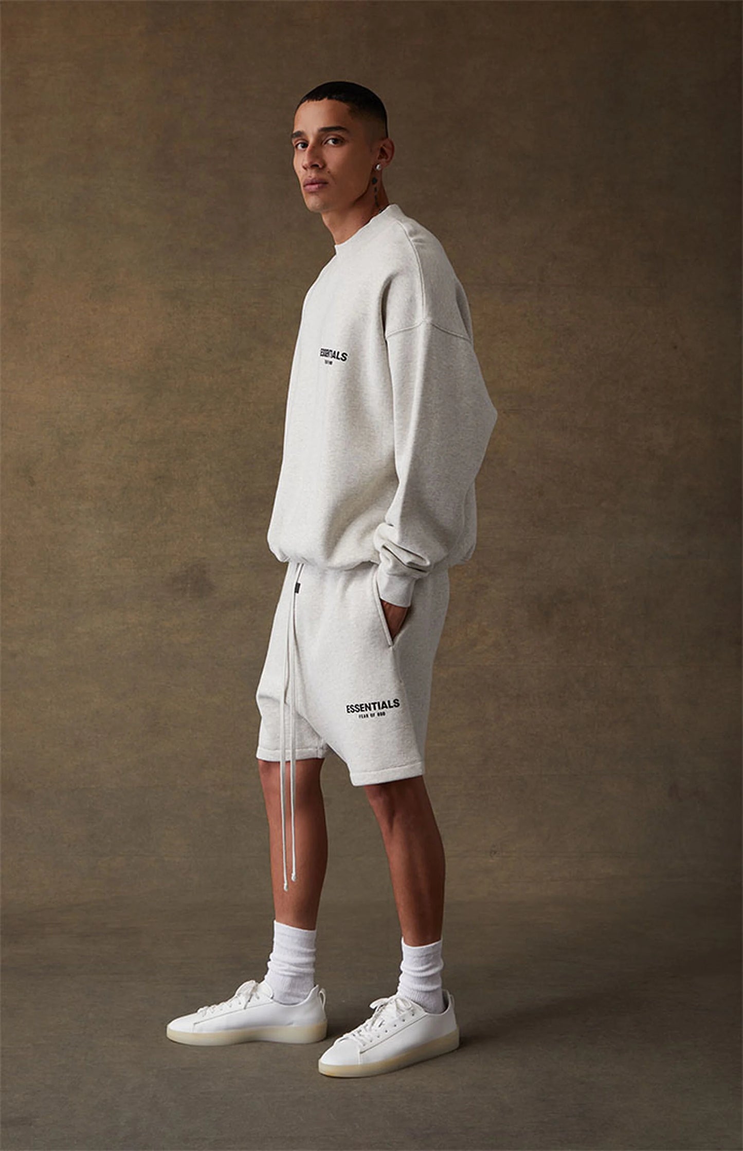 Fear of God Essentials Sweatshorts - Light Oatmeal — Jerry Lorenzo Essentials heavyweight basic, fleece sweatshort, front view