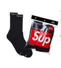 Supreme Hanes Socks 4-Pack - Black — Supreme x Hanes American basics collab, crew sock multipack, flat lay