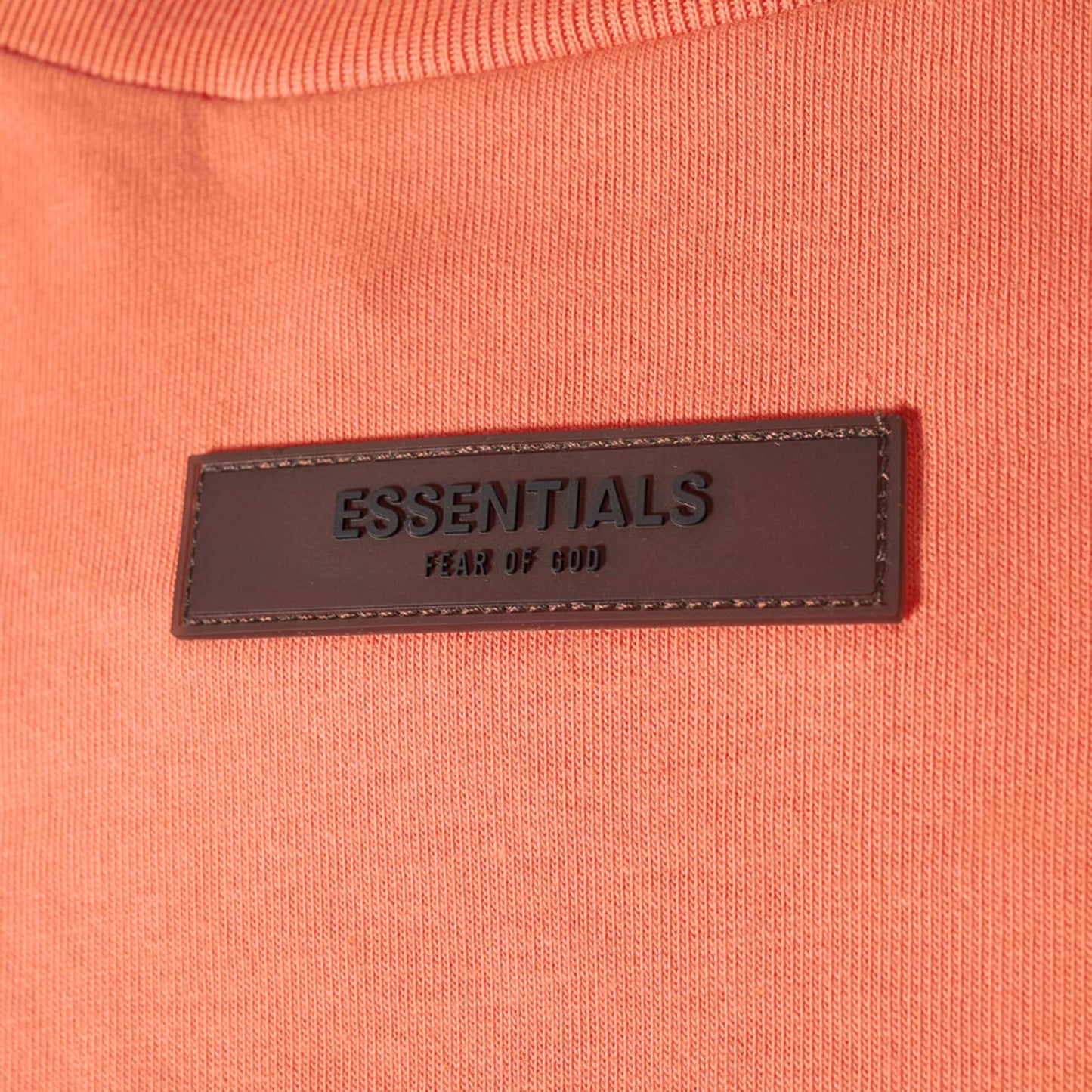 Fear of God Essentials Tee - Coral — Jerry Lorenzo Essentials heavyweight basic, short-sleeve cotton tee, front view