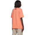 Fear of God Essentials Tee - Coral — Jerry Lorenzo Essentials heavyweight basic, short-sleeve cotton tee, front view