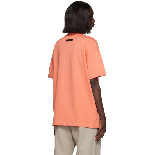 Fear of God Essentials Tee - Coral — Jerry Lorenzo Essentials heavyweight basic, short-sleeve cotton tee, front view