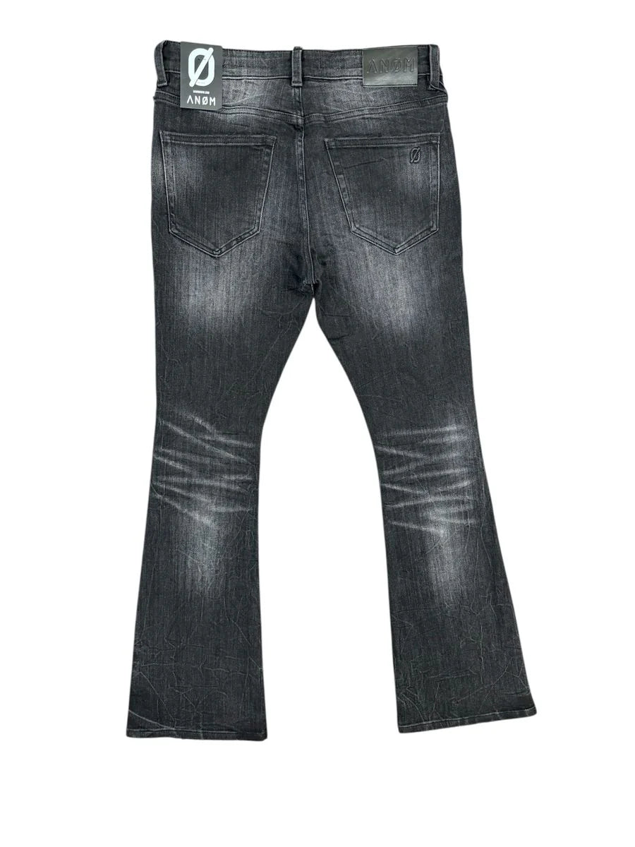 Anom Obscura Stacked Fit in Black Wash denim — front view