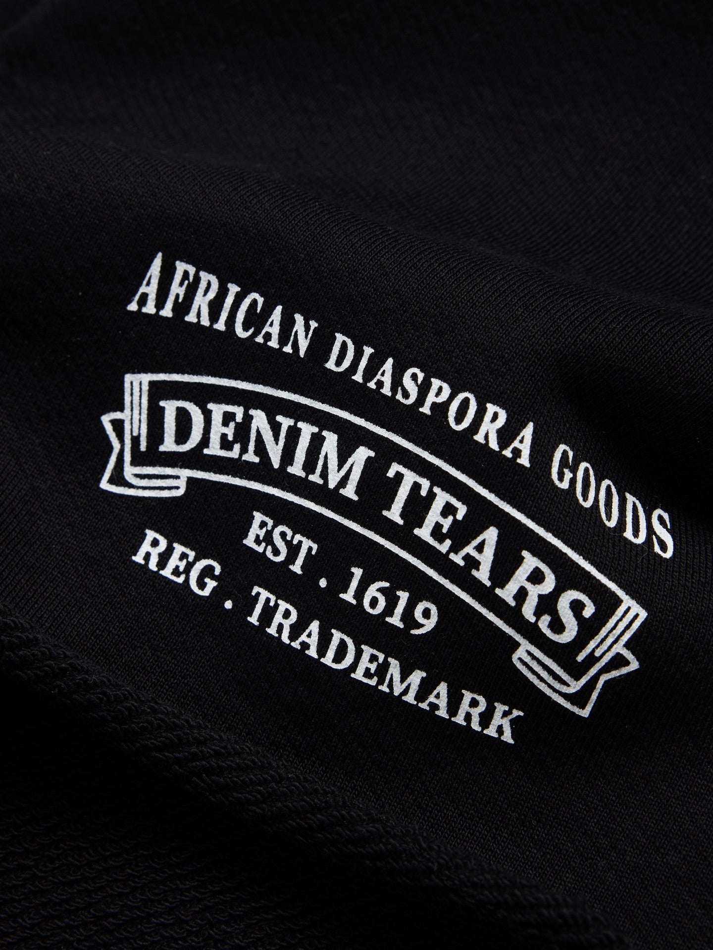 Denim Tears - ADG Sweatshort - Black/White — front view