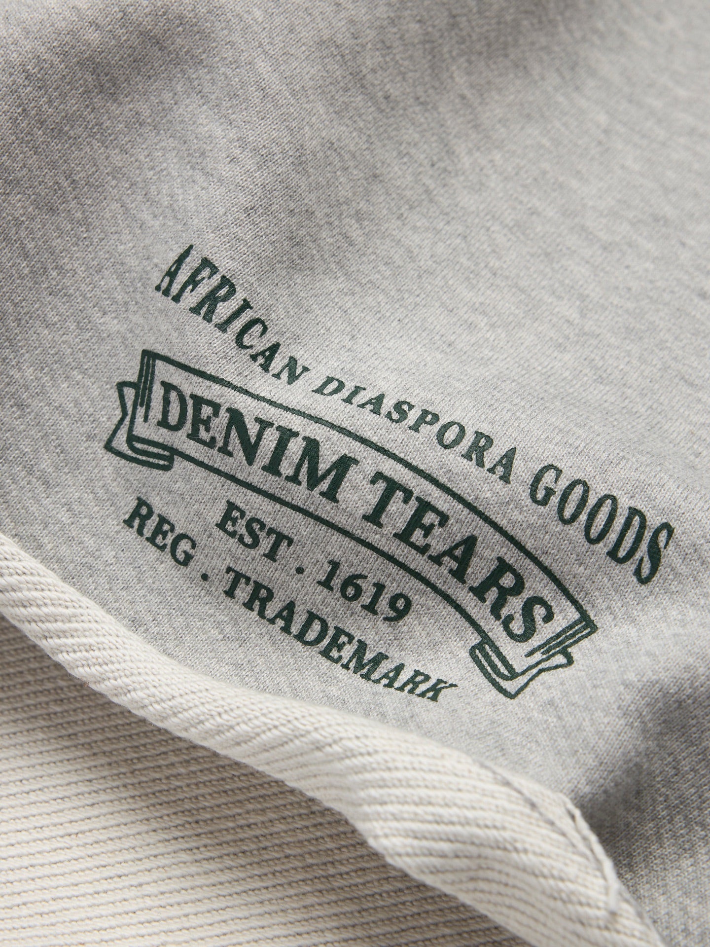 Denim Tears - ADG Sweatshort - Grey/White — front view