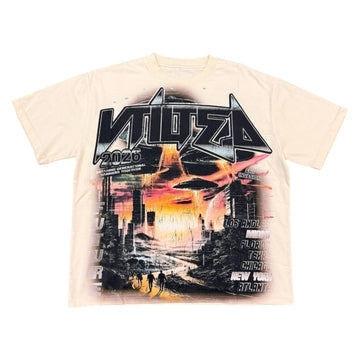 Vtilted "SPACE" oversized graphic tee in Cream — a fire-streaked sky over a fallen city, framed by tour-poster cities (LOS ANGELES · NEW YORK · ATLANTA) and the "2020" marker — a 